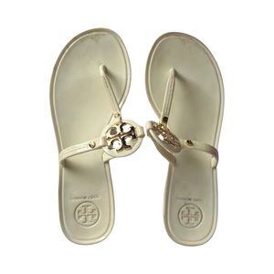 Tory Burch gold logo plastic flip flops size 5